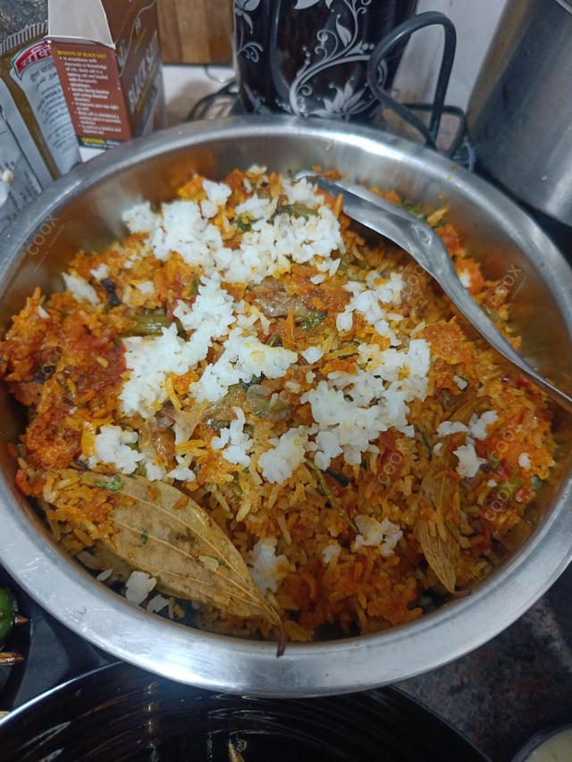 Delicious Veg Biryani prepared by COOX