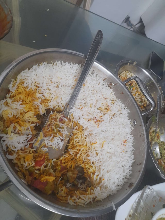 Delicious Veg Biryani prepared by COOX