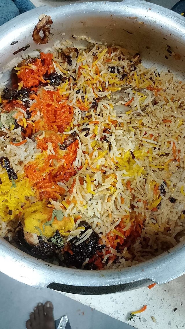 Delicious Chicken Biryani prepared by COOX