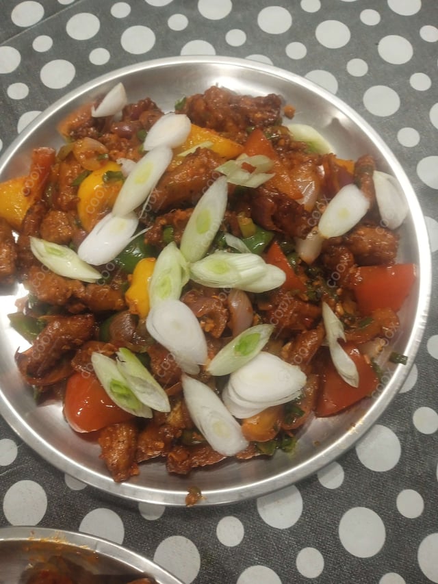 Delicious Crispy Chilli Baby Corn prepared by COOX