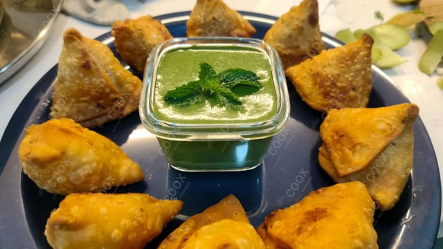 Delicious Mini Samosas prepared by COOX