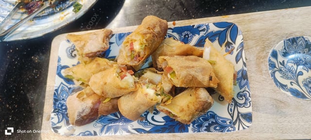 Delicious Veg Spring Rolls prepared by COOX