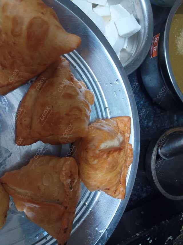 Delicious Mini Samosas prepared by COOX