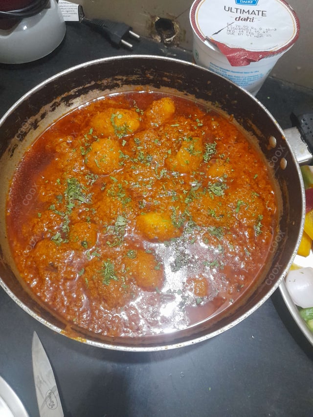 Delicious Dum Aloo prepared by COOX