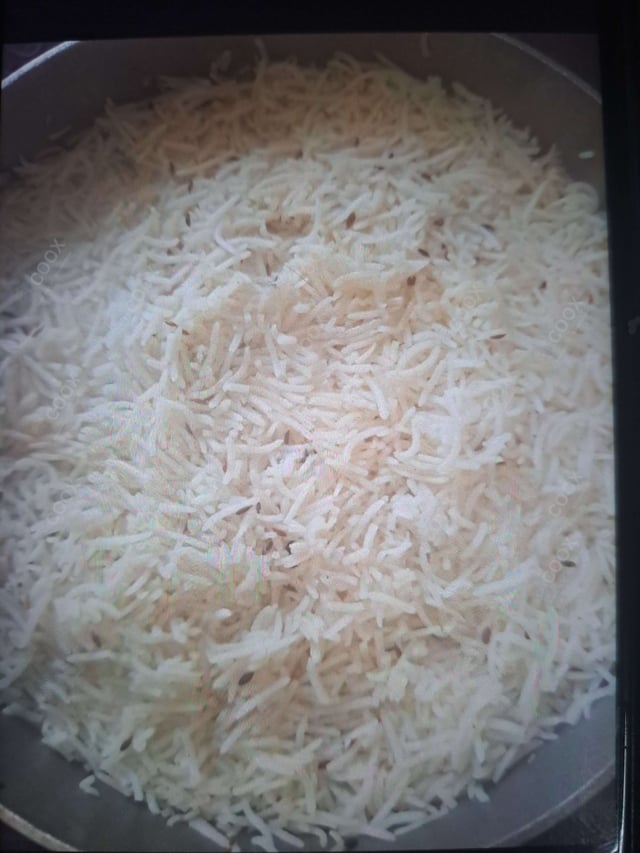 Delicious Jeera Rice prepared by COOX