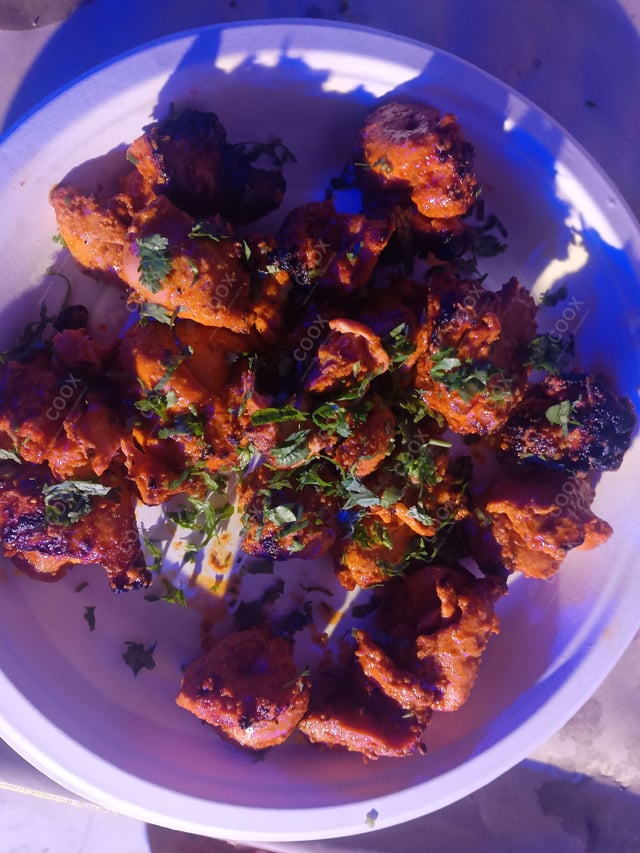 Delicious Chicken Tikka prepared by COOX