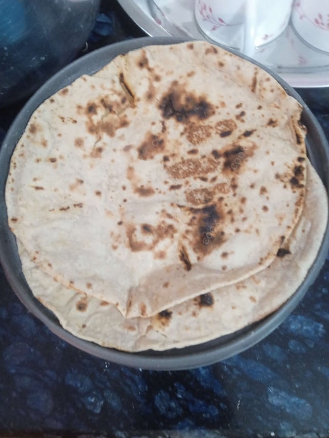 Delicious Tawa Rotis prepared by COOX