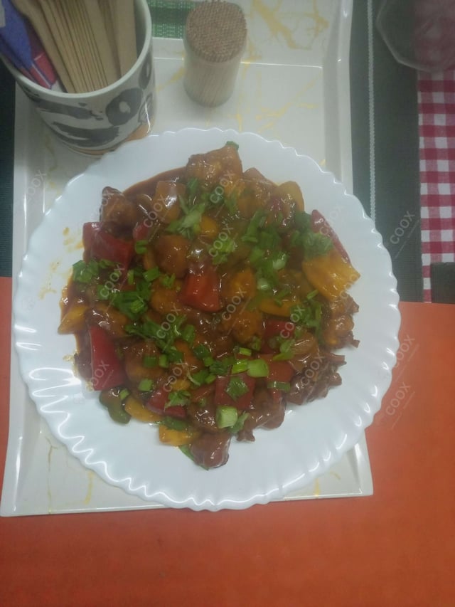 Delicious Chilli Chicken prepared by COOX