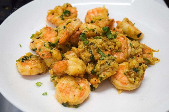 Delicious Butter Garlic Prawns prepared by COOX