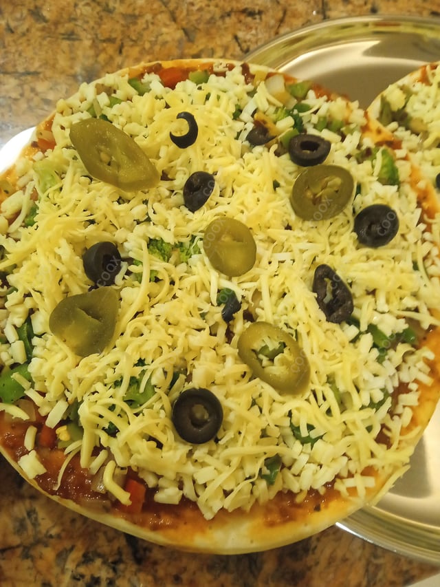 Delicious Veg Pizza prepared by COOX