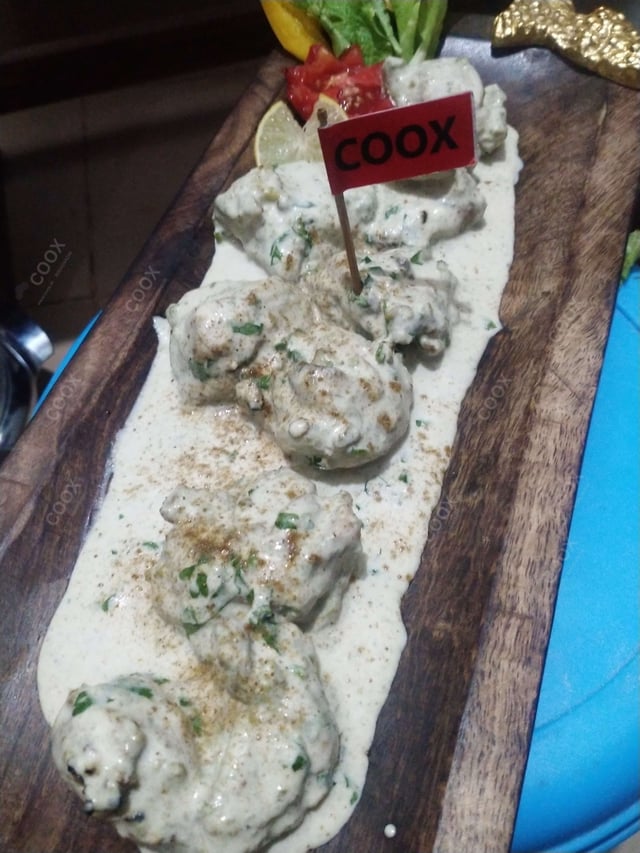 Delicious Murgh Malai Tikka prepared by COOX