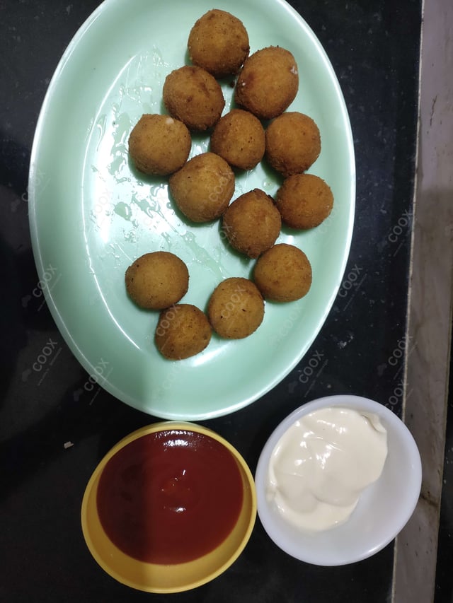 Delicious Fried Cheese Balls prepared by COOX