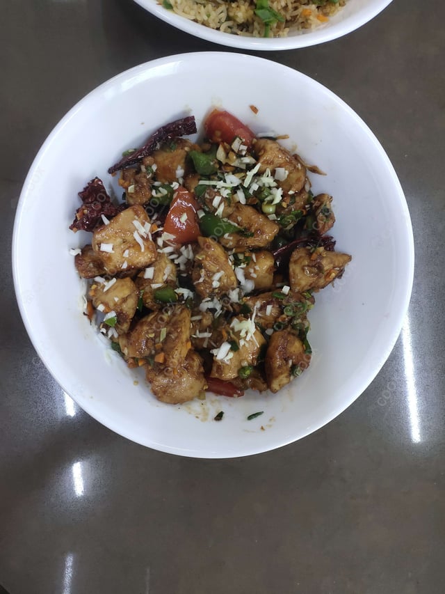 Delicious Kung Pao Chicken prepared by COOX