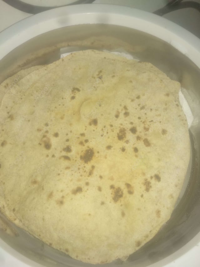 Delicious Tawa Rotis prepared by COOX