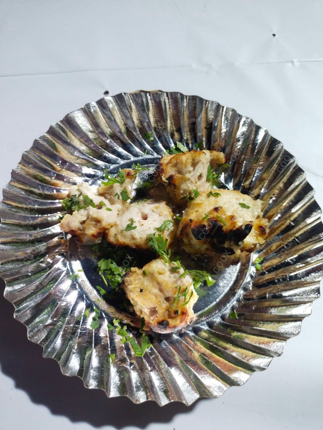 Delicious Murgh Malai Tikka prepared by COOX