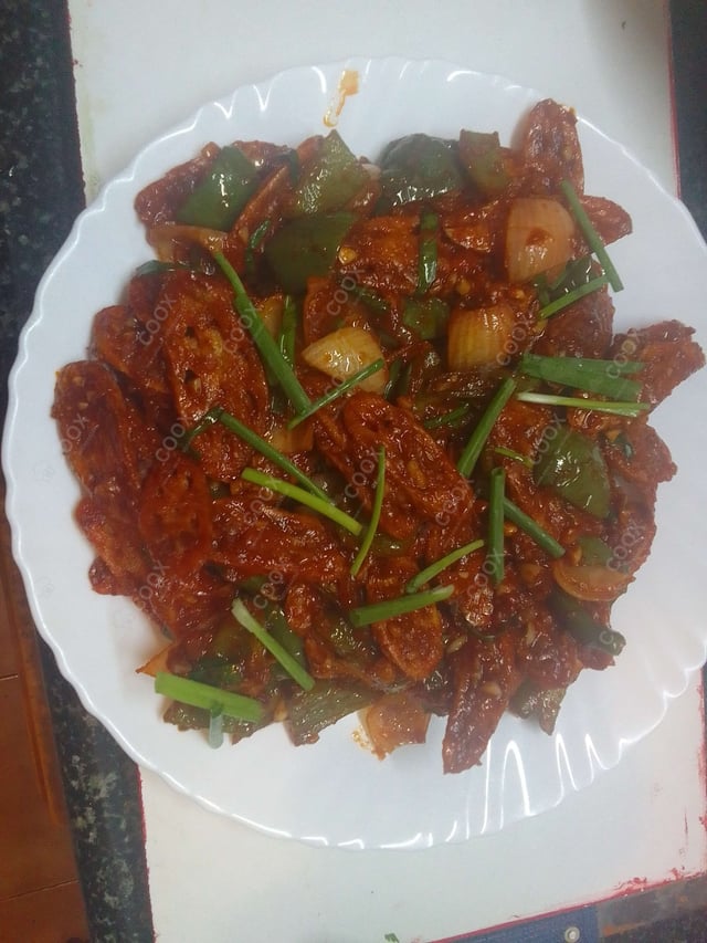 Delicious Chilli Lotus Stem prepared by COOX