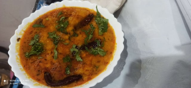 Delicious Dal Tadka prepared by COOX