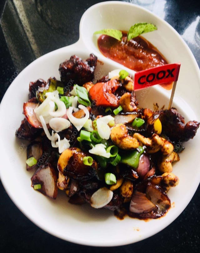 Delicious Kung Pao Chicken prepared by COOX