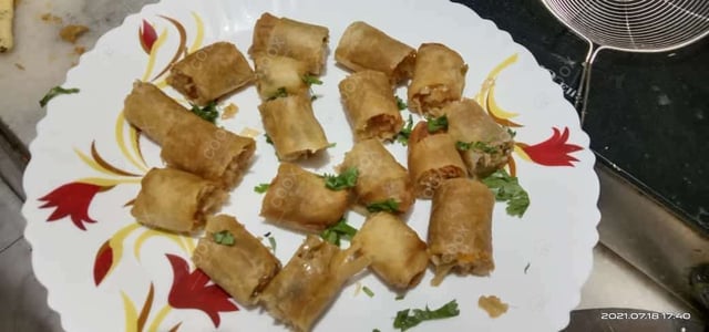 Delicious Veg Spring Rolls prepared by COOX