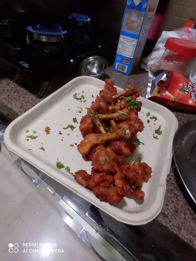 Delicious Chicken Lollipop prepared by COOX