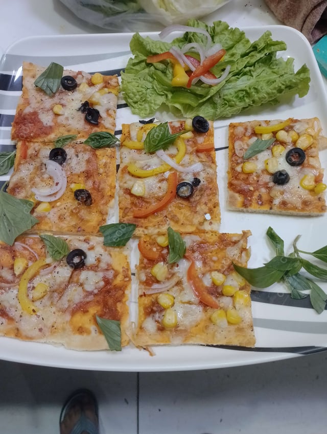 Delicious Margherita Pizza prepared by COOX