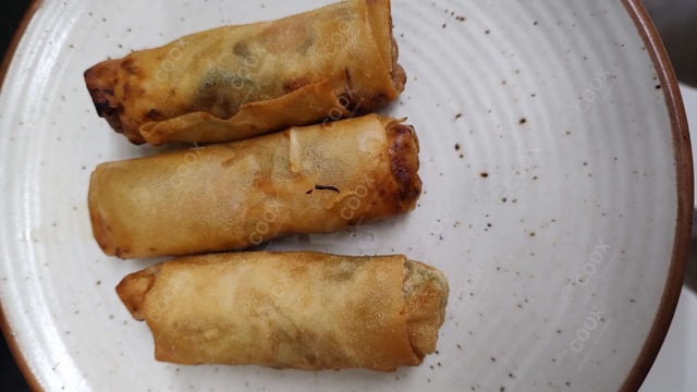 Delicious Veg Spring Rolls prepared by COOX