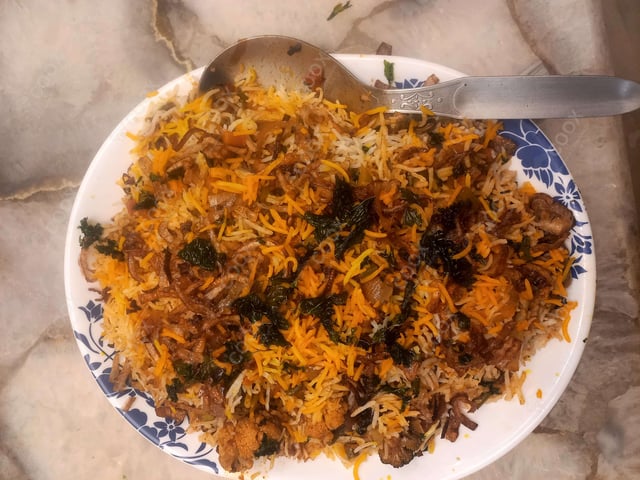 Delicious Veg Biryani prepared by COOX