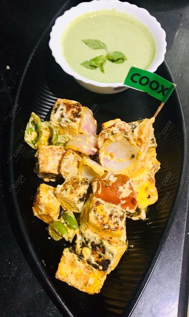 Delicious Paneer Tikka prepared by COOX