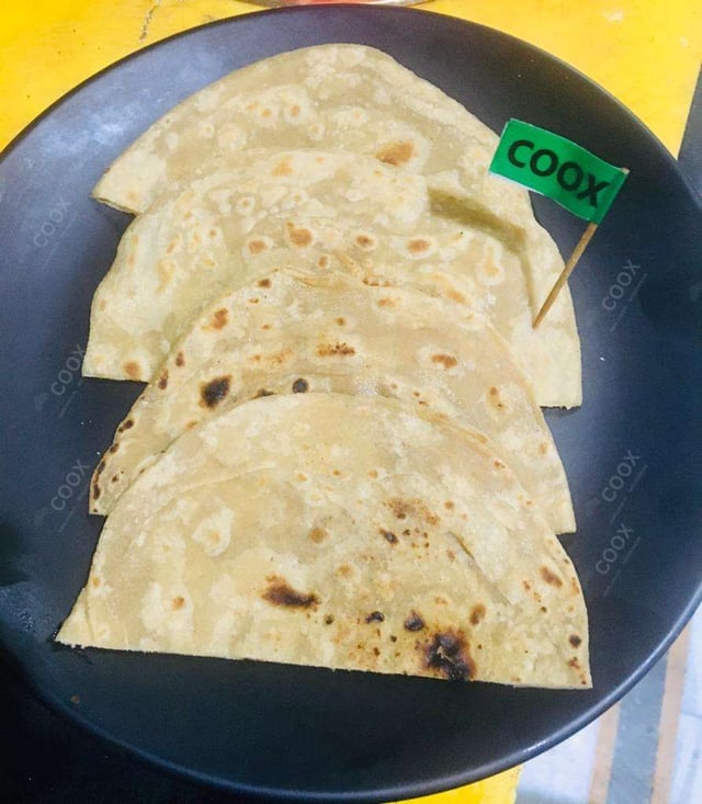 Delicious Lachha Parantha & Roti prepared by COOX