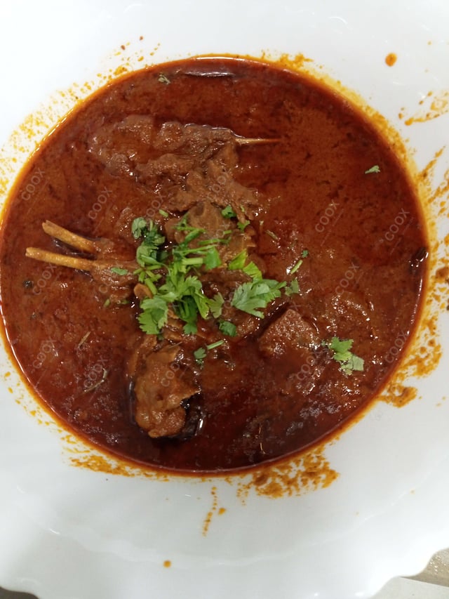 Delicious Mutton Rogan Josh prepared by COOX