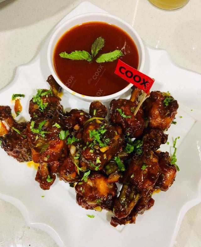 Delicious Chicken Lollipop prepared by COOX