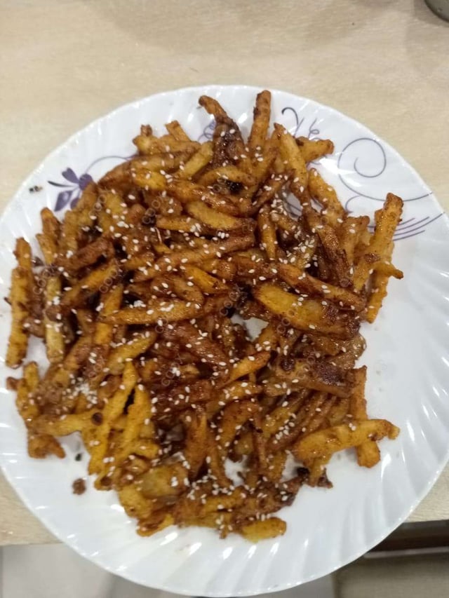 Delicious Honey Chilly Potato prepared by COOX