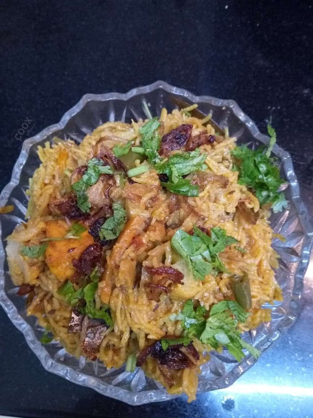 Delicious Veg Biryani prepared by COOX