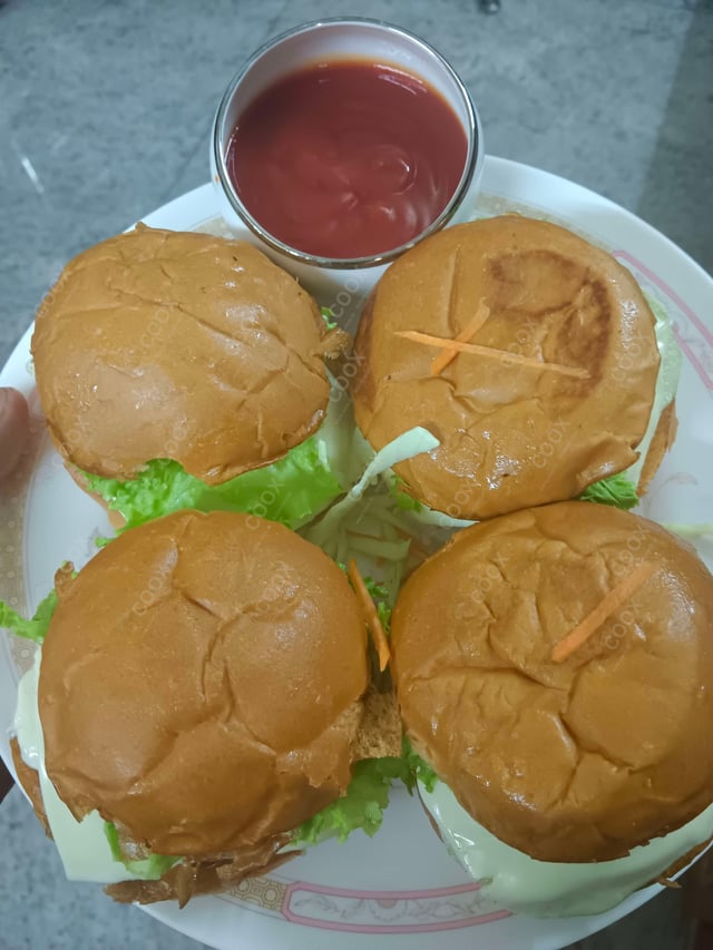 Delicious Mini Veg Burgers prepared by COOX