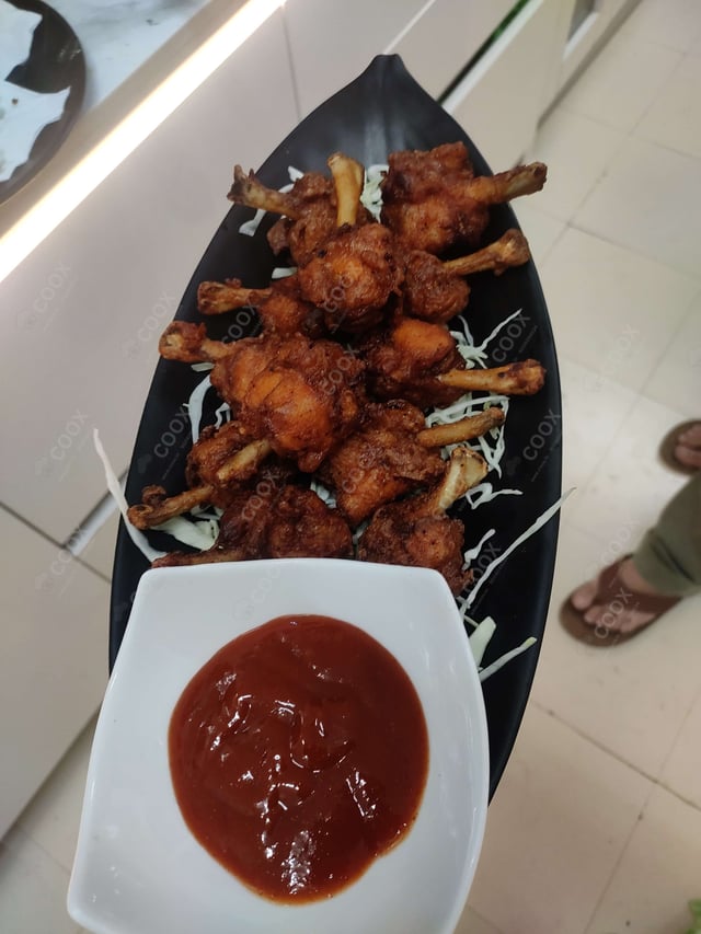 Delicious Chicken Lollipop prepared by COOX