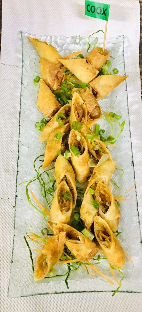 Delicious Veg Spring Rolls prepared by COOX