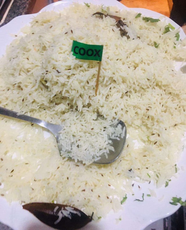 Delicious Jeera Rice prepared by COOX